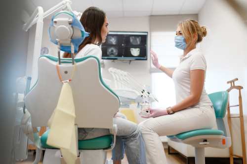 Dentist with Patient